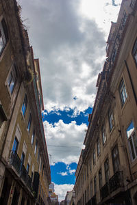 Low angle view of old buildings against sky