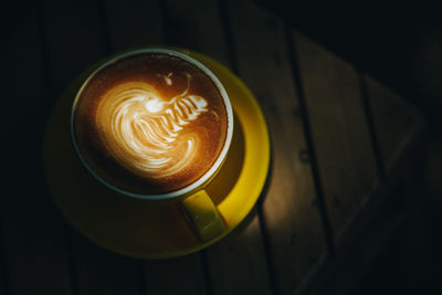 High angle view of cappuccino on table