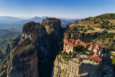 High angle view of buildings and mountains against sky