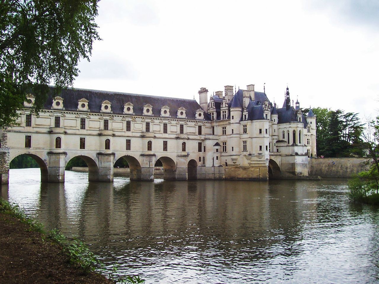 built structure, sky, architecture, water, building exterior, river, nature, tree, waterfront, day, arch, history, cloud - sky, travel destinations, the past, plant, bridge, connection, no people, bridge - man made structure, outdoors, arch bridge