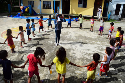 High angle view of people playing outdoors