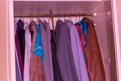 Clothes hanging on rack in store