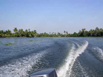 Scenic view of river against clear sky