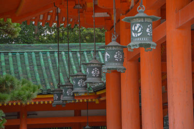 Close-up of illuminated lantern at temple