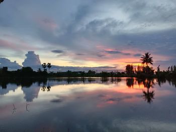 Scenic view of lake against sky during sunset