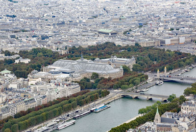 High angle view of river amidst buildings in city