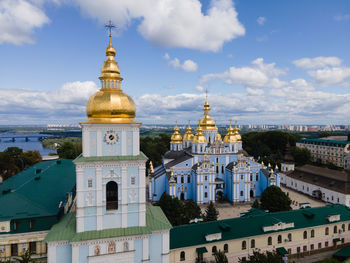 View of buildings in city against sky