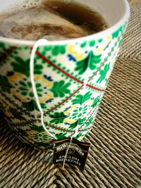 High angle view of coffee cup on table