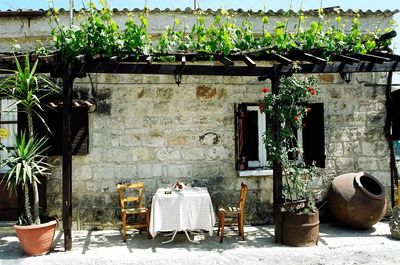 Chairs and table against the wall