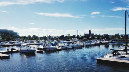 Boats moored at harbor