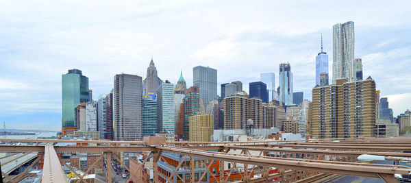 Modern buildings in city against sky