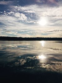 Reflection of clouds in calm sea