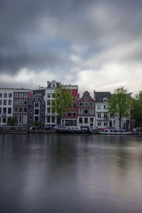 Long exposure shot of amsterdam canal at sunset