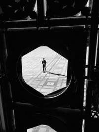 Silhouette man standing in bus