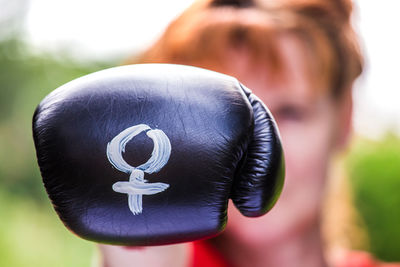 Close-up of sign on boxing glove