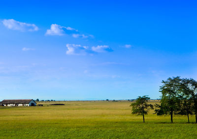 Scenic view of landscape against cloudy sky