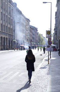 People walking on city street