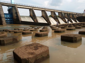 Bridge over river against sky