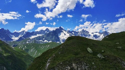 Scenic view of snowcapped mountains against sky