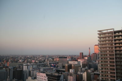 High angle view of buildings against sky during sunset