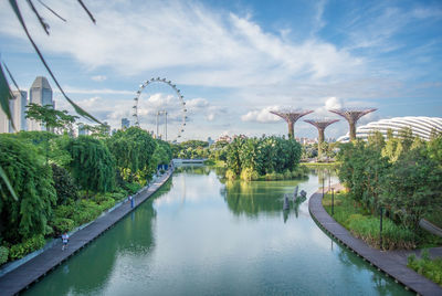 View of bridge over river against cloudy sky