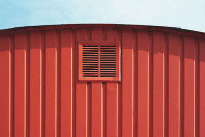 Low angle view of window on building against sky