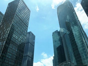 Low angle view of modern buildings against sky