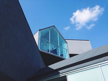 Low angle view of built structure against blue sky