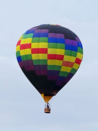 Low angle view of hot air balloon flying in sky