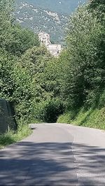 Scenic view of road seen through car windshield