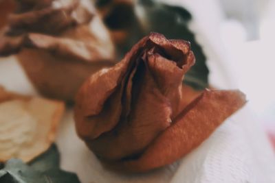 Close-up of chocolate cake on paper