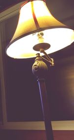 Low angle view of illuminated lamp