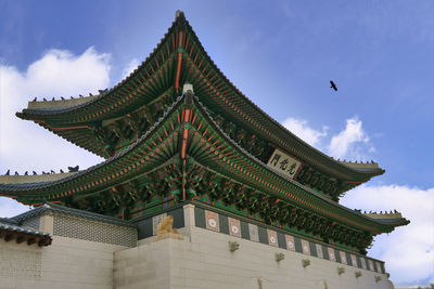 Low angle view of temple building against sky