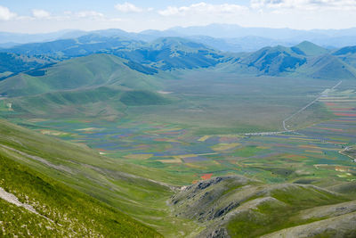 High angle view of landscape against sky in castelluccio, umbria, italy 