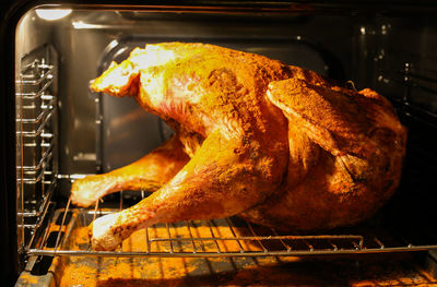 Close-up of meat on barbecue grill