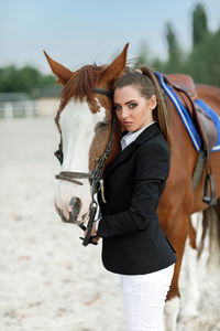 Horse standing on field