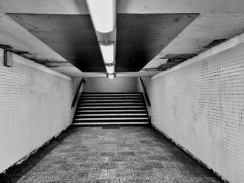 Steps in illuminated corridor