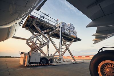 Low angle view of airplane against sky