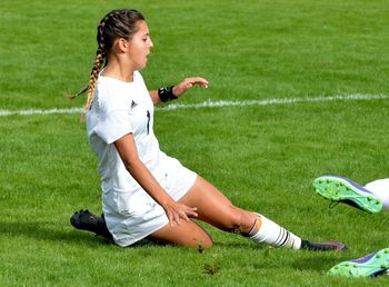 Girl playing on grassland