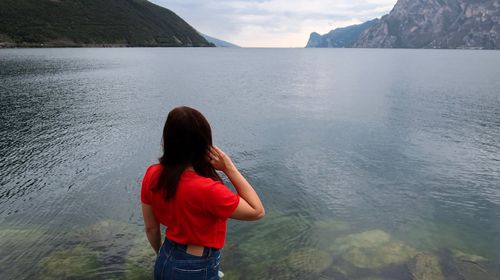 Rear view of woman looking at sea