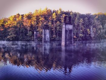 Scenic view of lake against sky during autumn