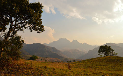 Scenic view of mountains against sky during sunset