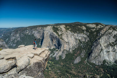 Man standing on cliff