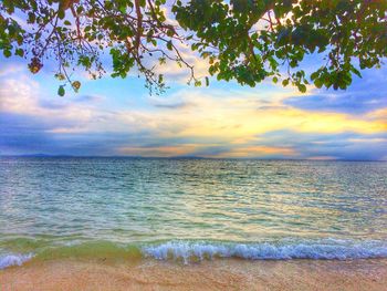 Scenic view of sea against cloudy sky