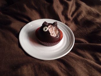 Close-up of cake in plate on table