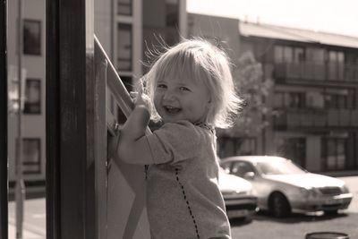 Portrait of cute girl standing outdoors