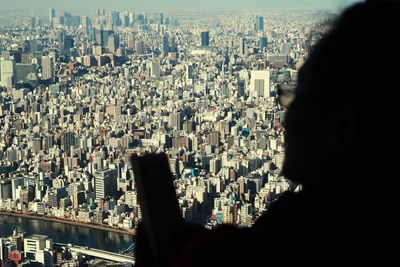 Midsection of cityscape with skyscrapers in background