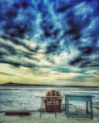 Scenic view of sea against cloudy sky