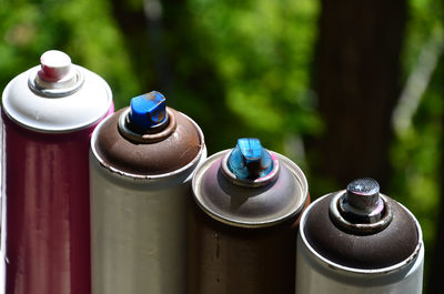 Close-up of spray cans