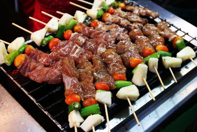 High angle view of food on barbecue grill